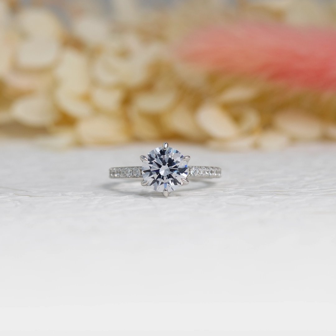 Round silver solitaire engagement ring